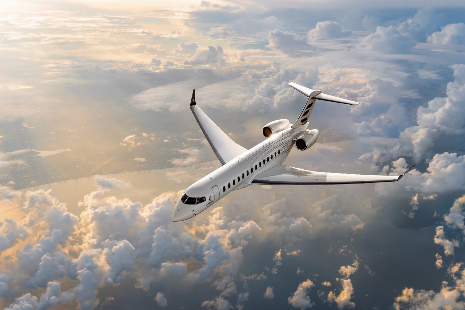 Bombardier Global 7500 flying above clouds at sunset